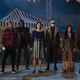 The Doom Patrol arriving at a carnival to fight the Candlemaker.